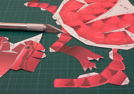 cutting out the paper model pieces