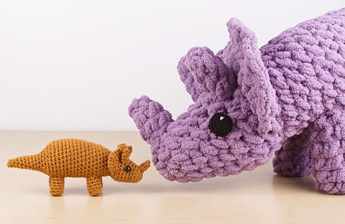 Giant Amigurumi Triceratops Dinosaur by PlanetJune together with a standard-sized triceratops