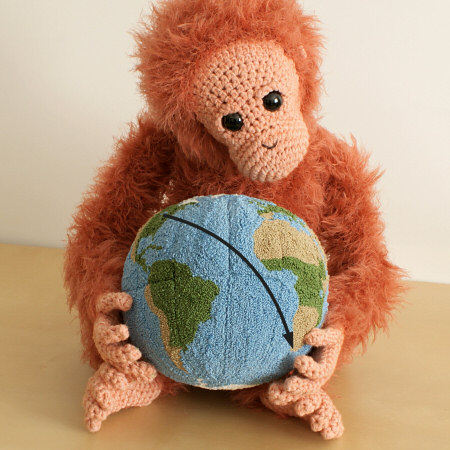 punchneedle globe (with crocheted orangutan) by planetjune