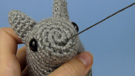 secure stitching for amigurumi faces and embellishments, by planetjune