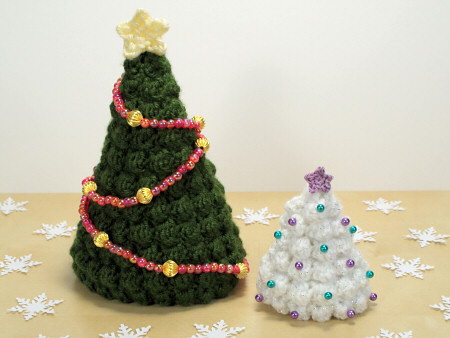 crocheted Christmas trees by planetjune