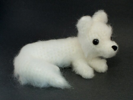 crocheted fluffy arctic fox by planetjune
