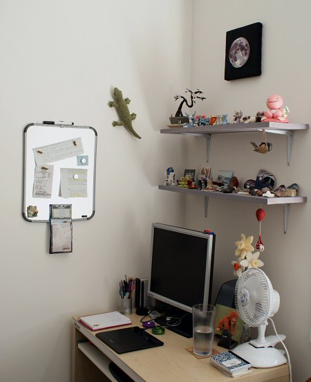 amigurumi gecko on the wall of my craft room