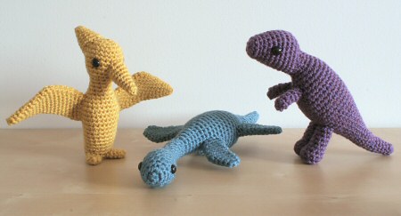crocheted dinosaurs by planetjune