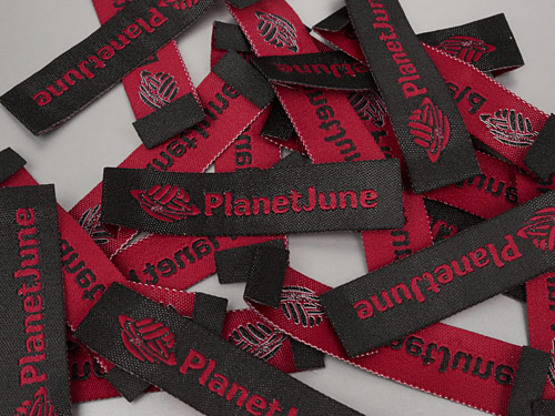 PlanetJune custom woven labels from Dutch Label Shop