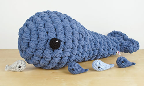 extreme amigurumi whale and standard size whales - all use the Tiny Whale crochet pattern by PlanetJune)