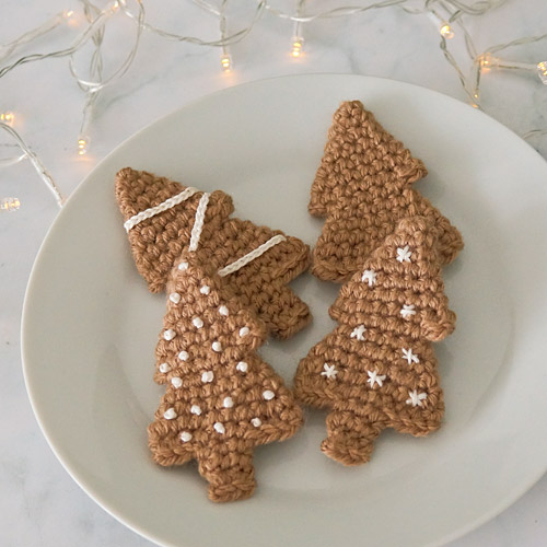 embroidered gingerbread trees from the Gingerbread Tree & Christmas Tree Ornaments crochet pattern by PlanetJune