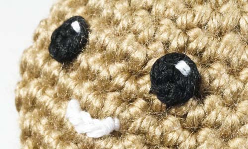 example of embroidered catchlight on crocheted amigurumi eyes