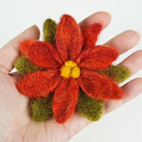 needlefelted poinsettia by planetjune