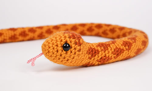 spotted snake from the Snake Collection crochet pattern by planetjune