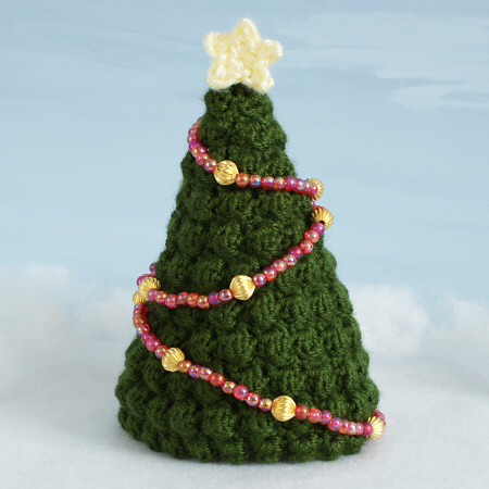 crocheted Christmas trees by planetjune