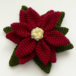 crocheted poinsettia by planetjune