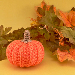 crocheted pumpkins by planetjune